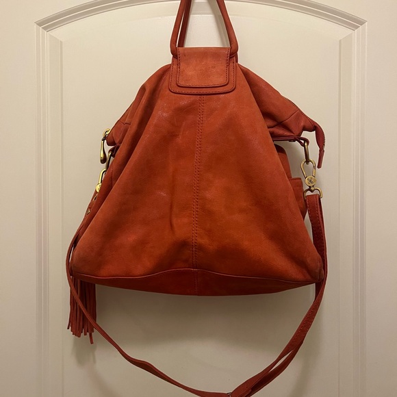 Lava colored leather hobo bag with a tassel. Perfect for summer and fall. - Picture 2 of 3